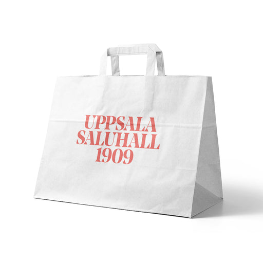 Papperspåsar med platta handtag i 90gsm vitt kraftpapper – Profileproduction
