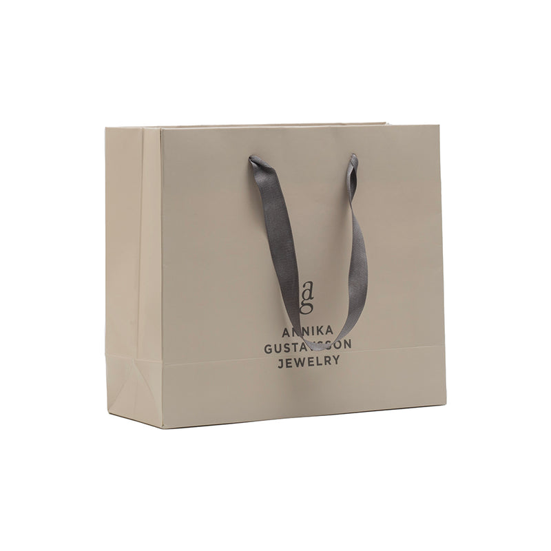 Papperspåsar DELUXE 31+12x31cm – Profileproduction